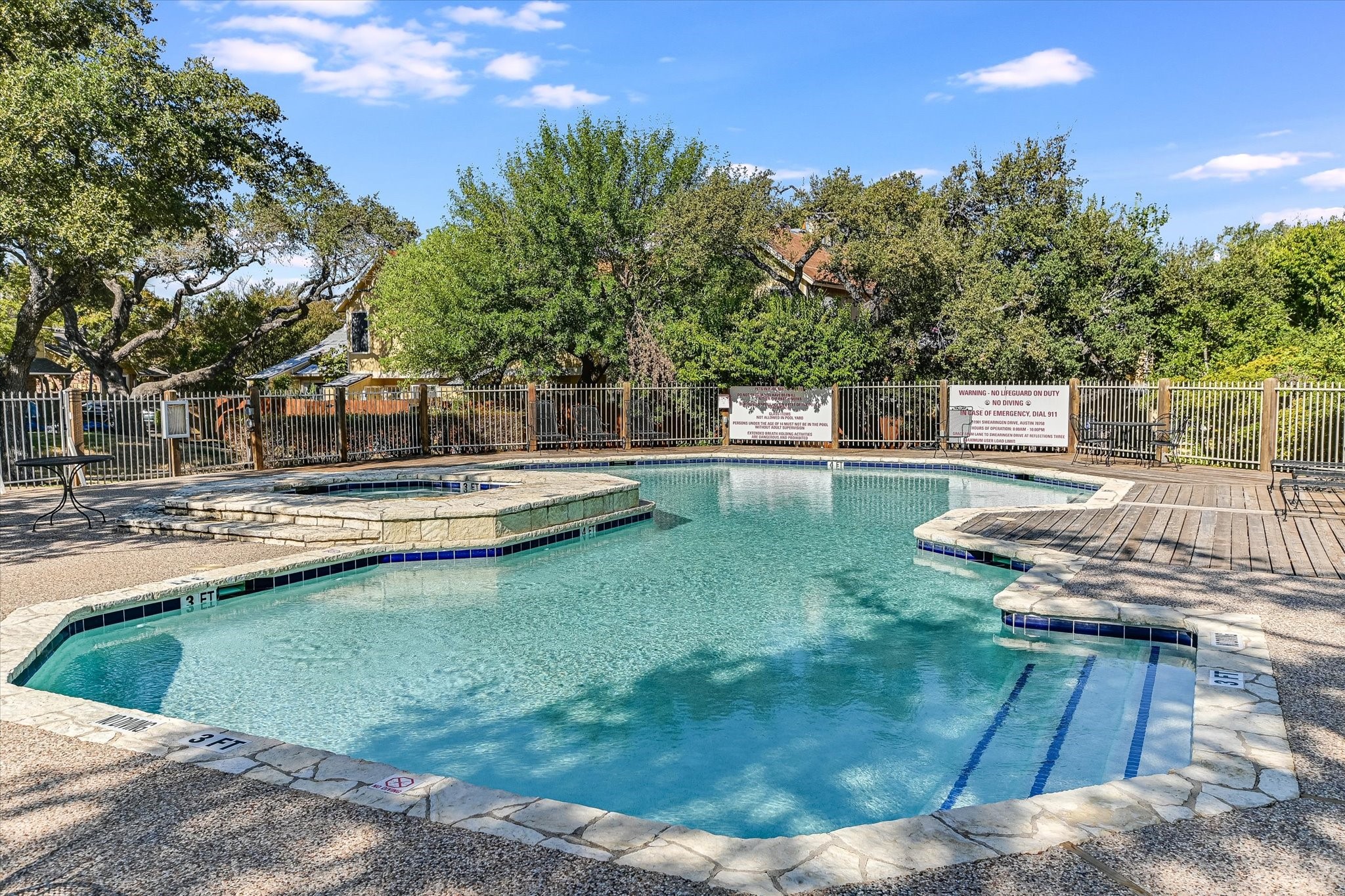 Undisclosed Address Austin, TX 78758 - Photo 14 of 19 a view of a swimming pool with a patio