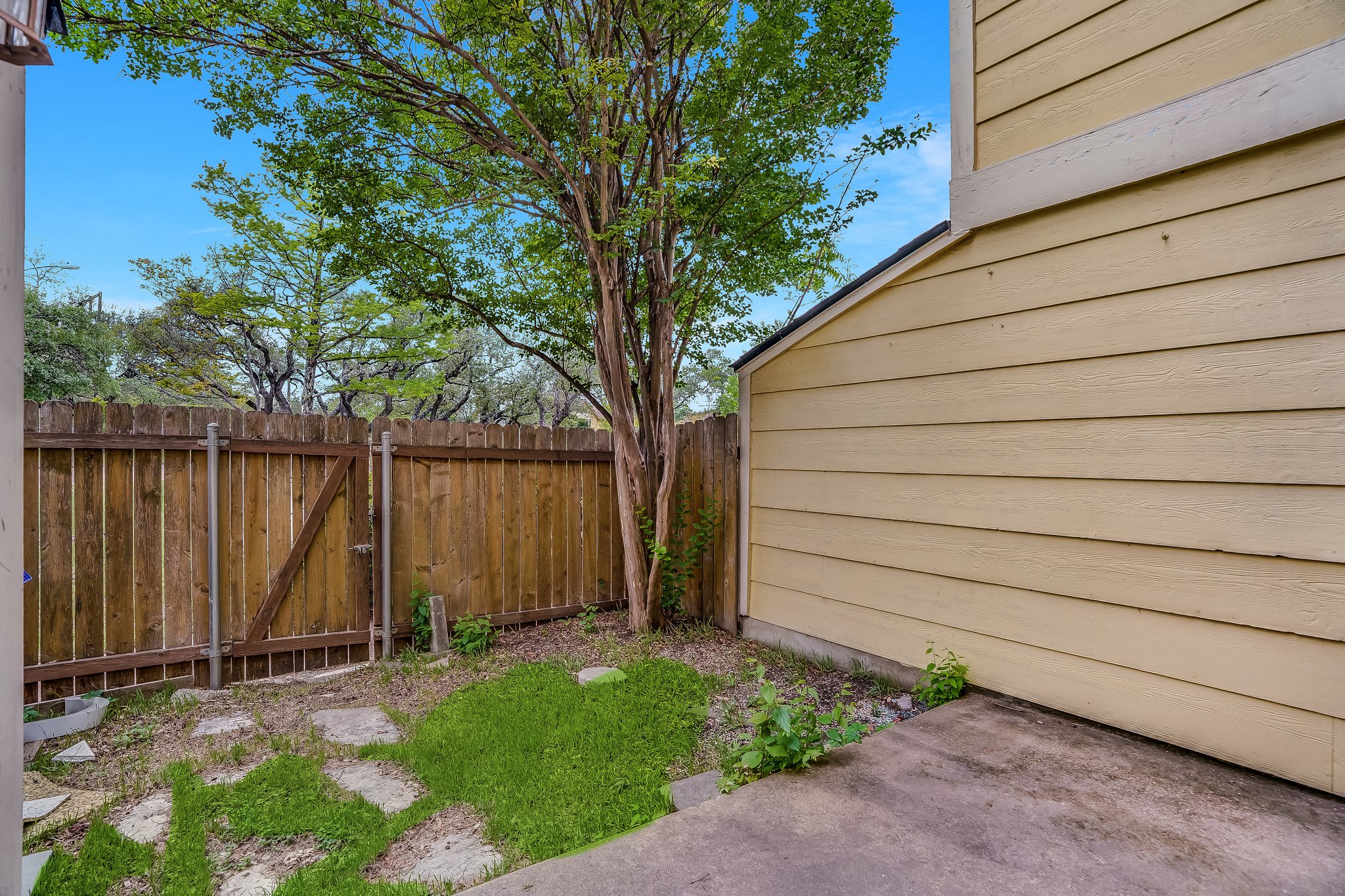 Undisclosed Address Austin, TX 78758 - Photo 19 of 19 a backyard of a house