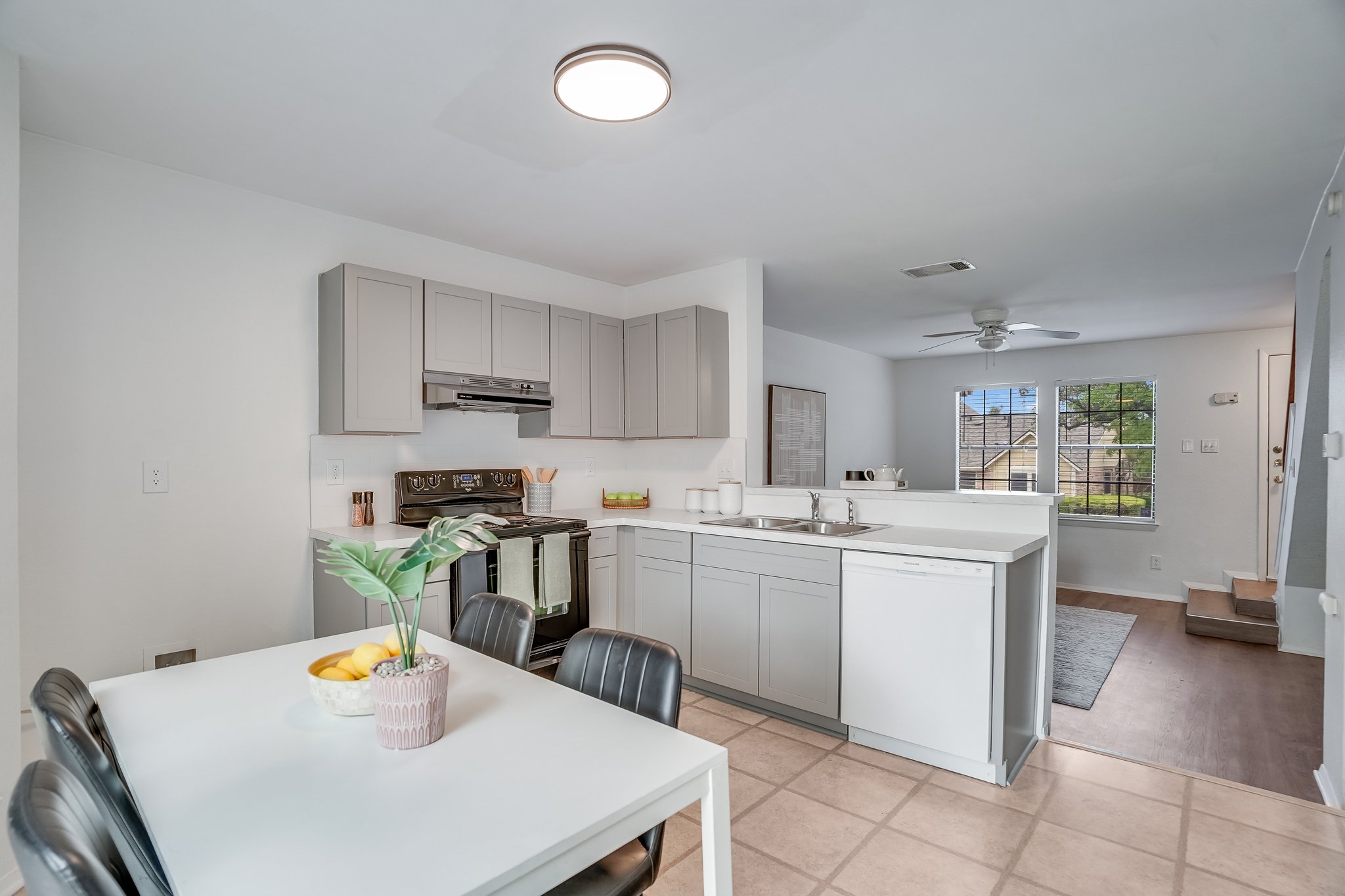 Undisclosed Address Austin, TX 78758 - Photo 7 of 19 a kitchen that has a lot of cabinets in it and appliances