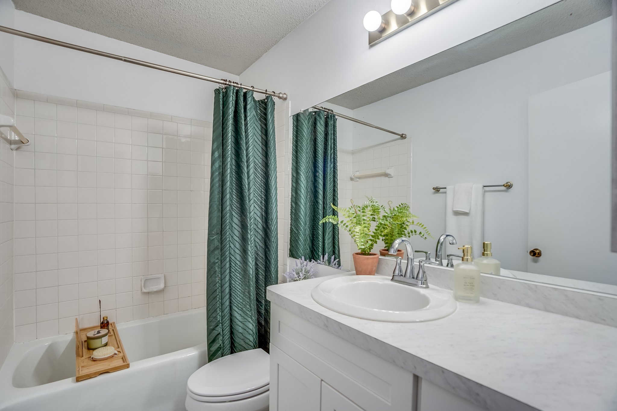 Undisclosed Address Austin, TX 78758 - Photo 9 of 19 a bathroom with a sink toilet and shower