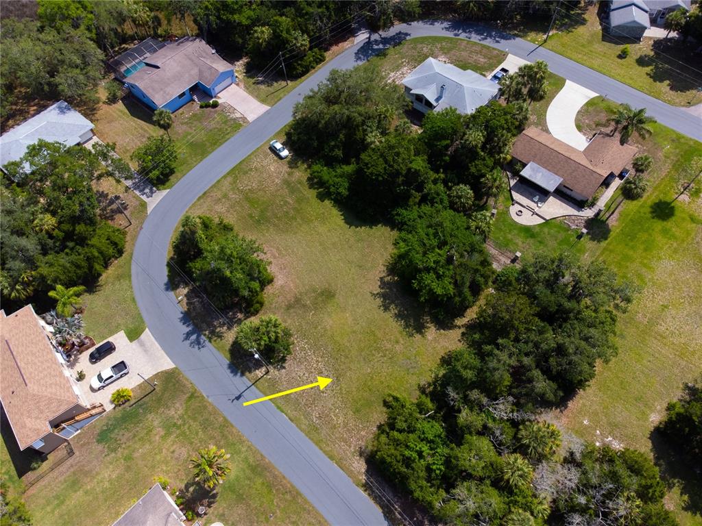 4540 South Sawgrass Circle Homosassa, FL 34448 - Photo 16 of 22 an aerial view of a house with a garden and swimming pool