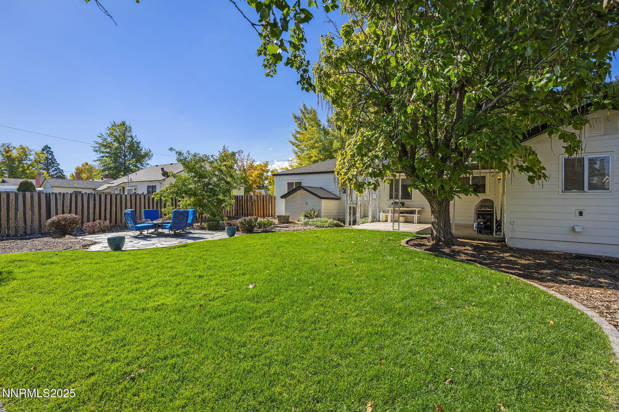 640 Robin Street Reno, NV 89509 - Photo 25 of 25 a view of a house with backyard and sitting area