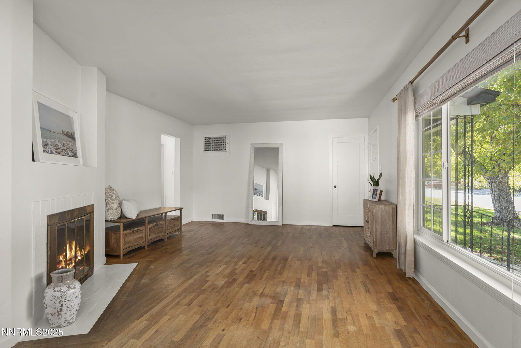 640 Robin Street Reno, NV 89509 - Photo 7 of 25 a view of a livingroom with furniture and a fireplace