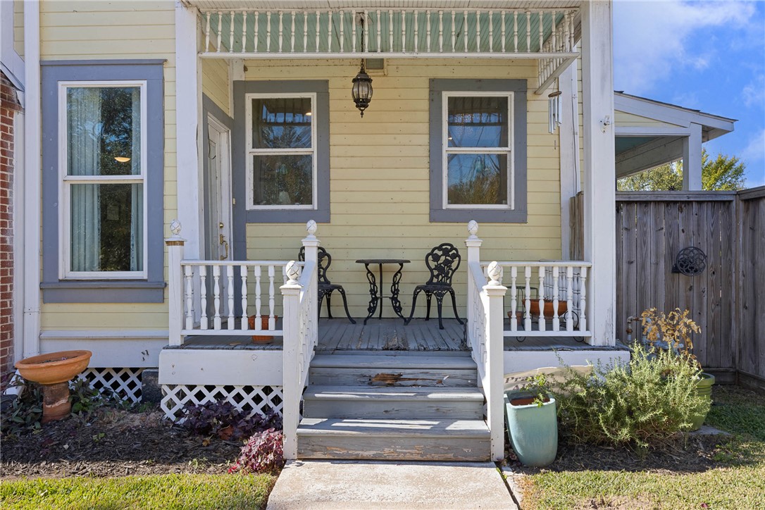 1017 Water Street Navasota, TX 77868 - Photo 4 of 28 a view of a house with porch and chairs