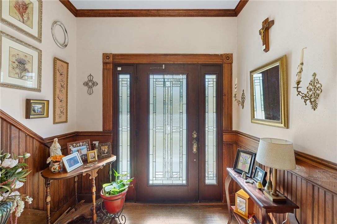 1017 Water Street Navasota, TX 77868 - Photo 7 of 28 a view of an entryway with wooden floor and windows