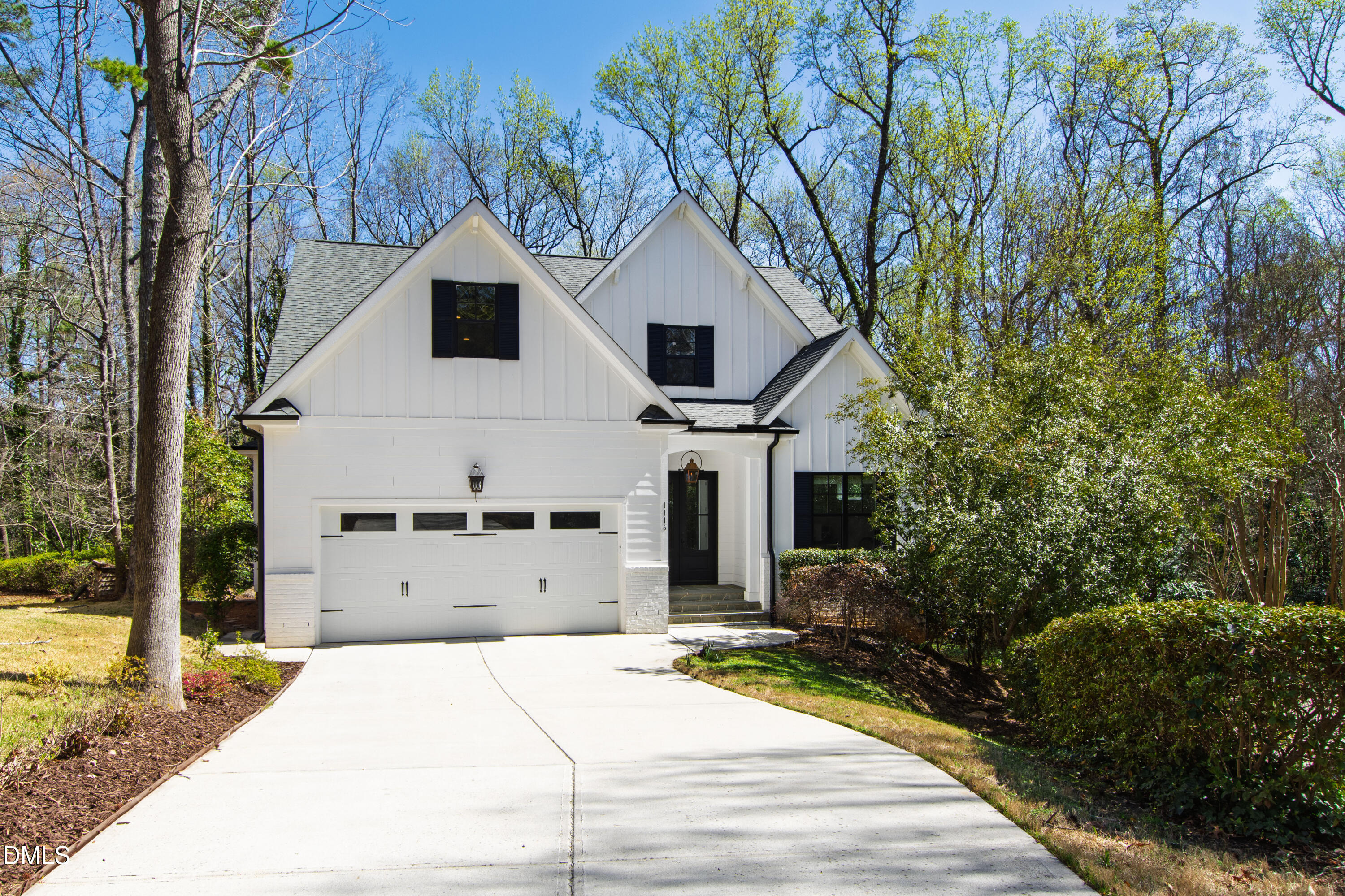 1116 Hymettus Court Raleigh, NC 27607 - Photo 1 of 69 a front view of a house with a yard and garage