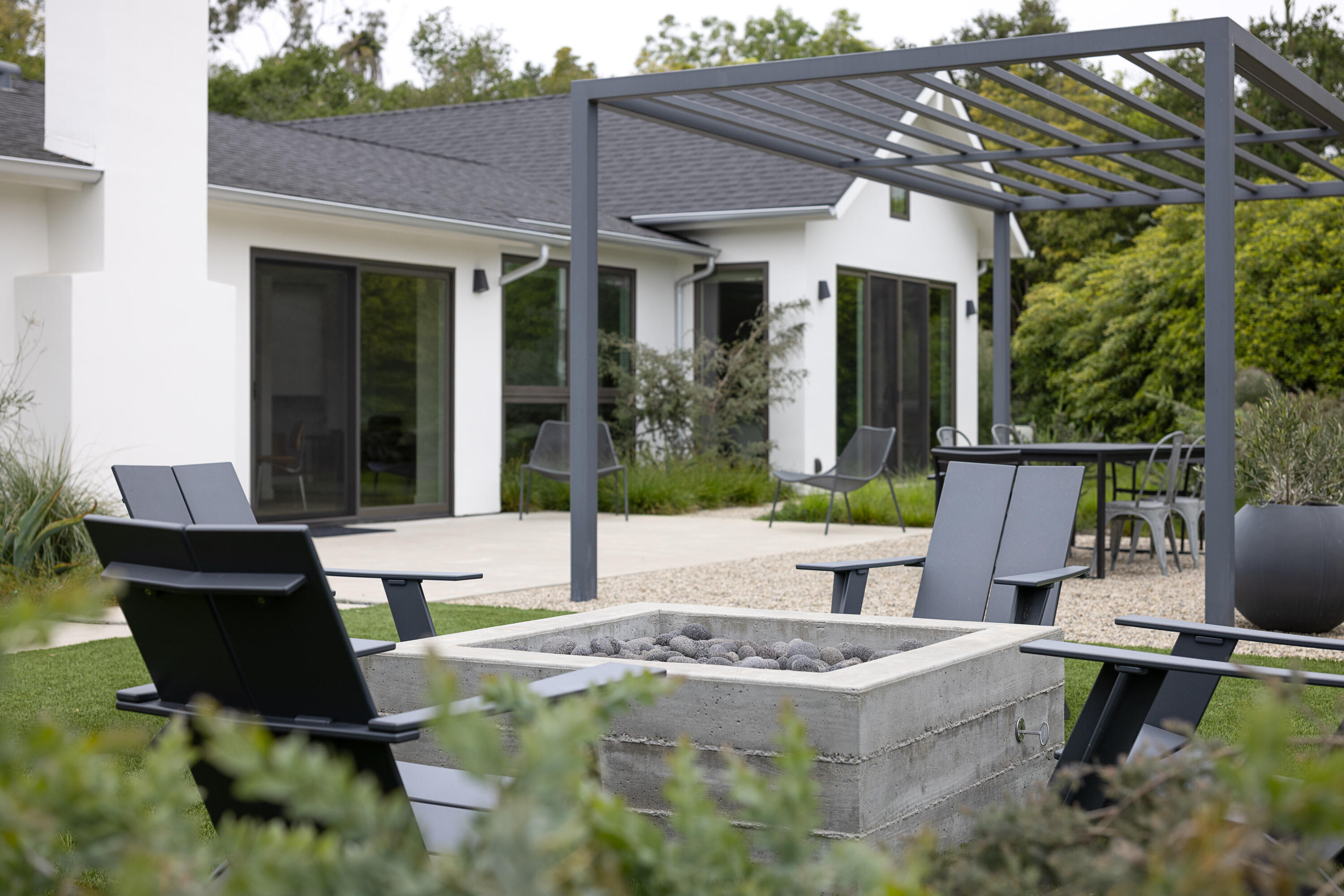 3155 Eucalyptus Hill Road Montecito, CA 93108 - Photo 13 of 30 a view of a patio with table and chairs and potted plants