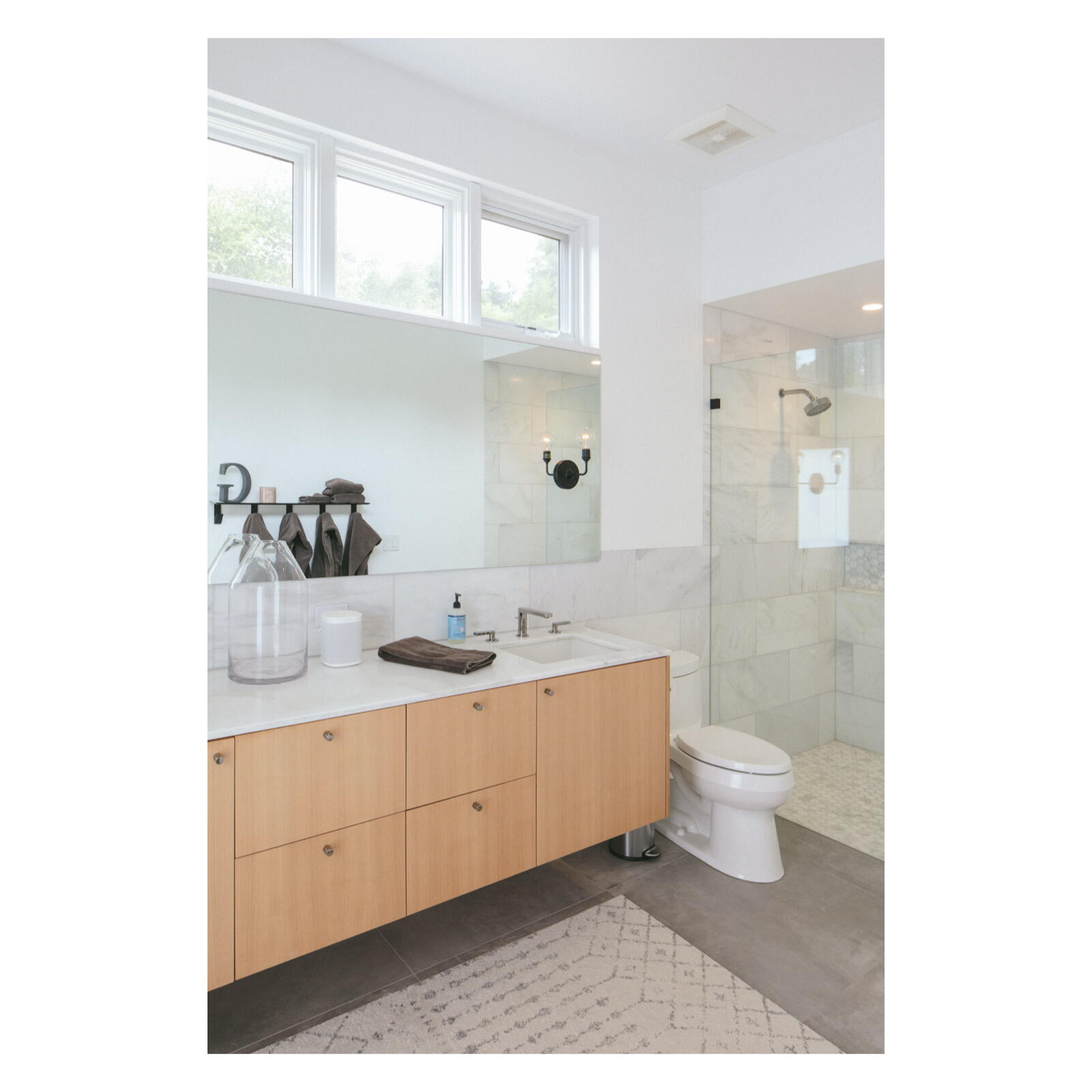 3155 Eucalyptus Hill Road Montecito, CA 93108 - Photo 17 of 30 a bathroom with a toilet a sink and mirror