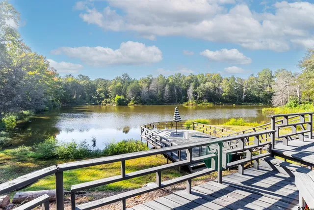 a view of a lake from a balcony