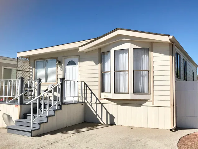 a front view of a house with a balcony