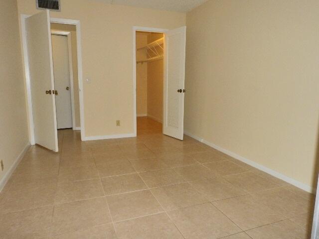556 Fanshaw North, Unit 556 Boca Raton, FL 33434 - Photo 40 of 73 Bed with Walking Closet