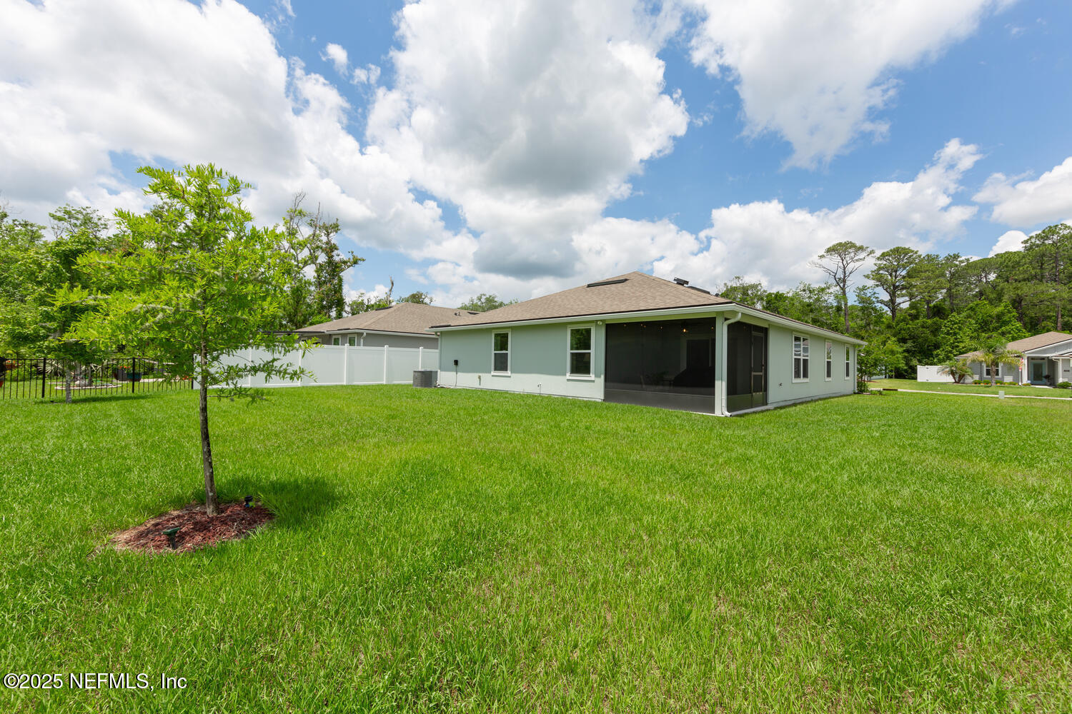 352 Chasewood Drive St. Augustine, FL 32095 - Photo 28 of 29 a front view of a house with garden and yard