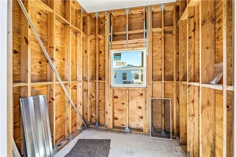 wooden floor with a glass door