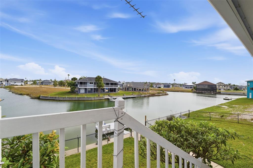 3366 Bluefish Drive Hernando Beach, FL 34607 - Photo 26 of 75 a view of a lake from a balcony