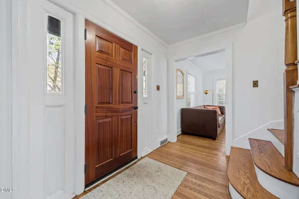 a living room with furniture and a gate