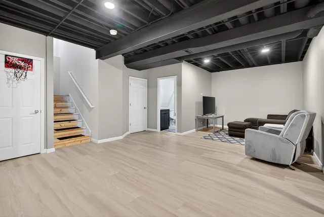 a view of livingroom with furniture and stairs