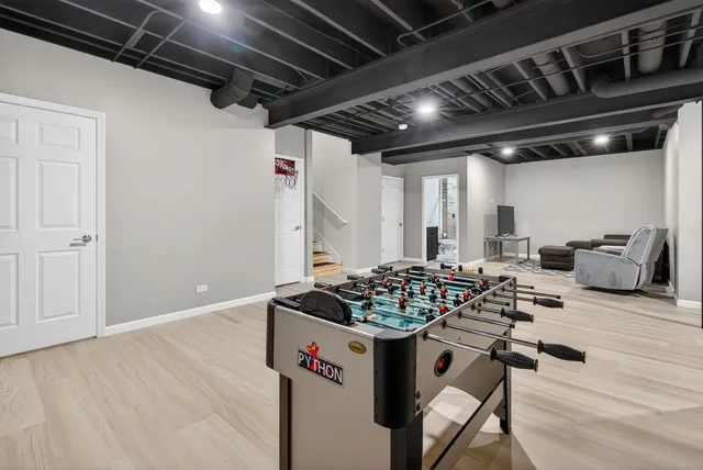 a view of a livingroom with wooden floor