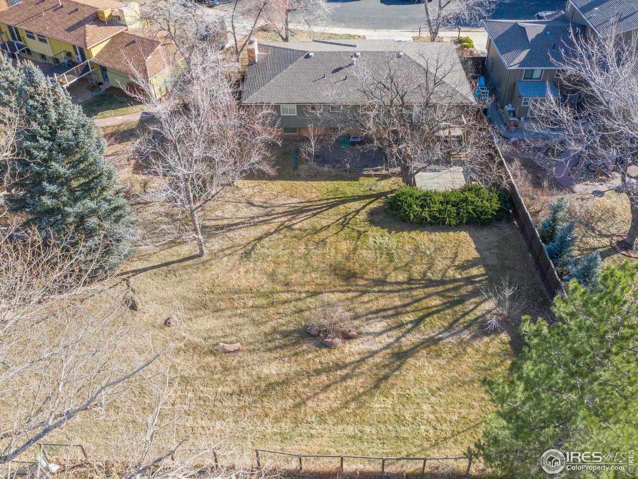 2287 Holyoke Drive Boulder, CO 80305 - Photo 3 of 40 a view of a yard with a fountain