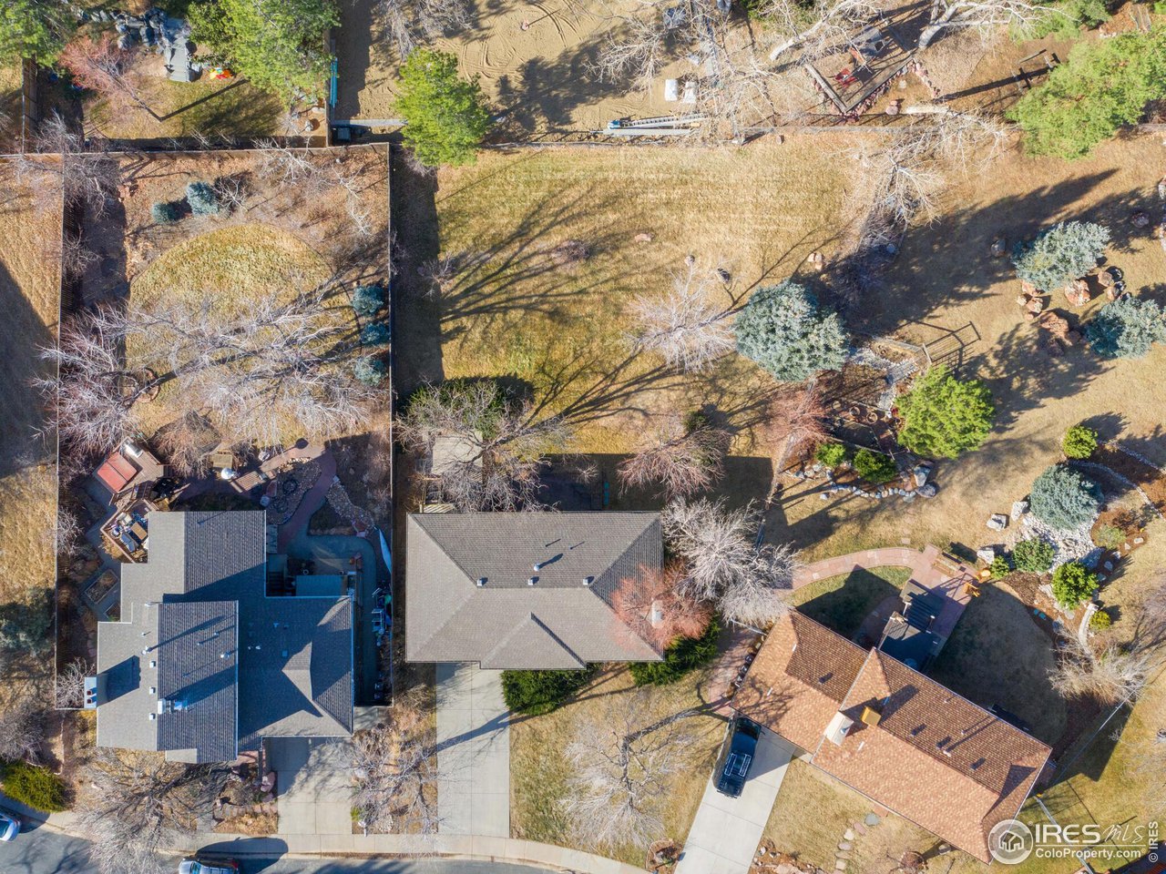 2287 Holyoke Drive Boulder, CO 80305 - Photo 34 of 40 an aerial view of a house with a yard