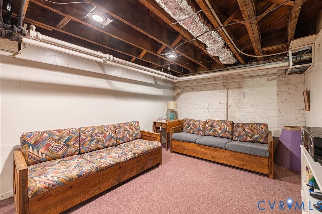 5013 Caledonia Road Richmond, VA 23225 - Photo 47 of 57 a living room with furniture and a couch