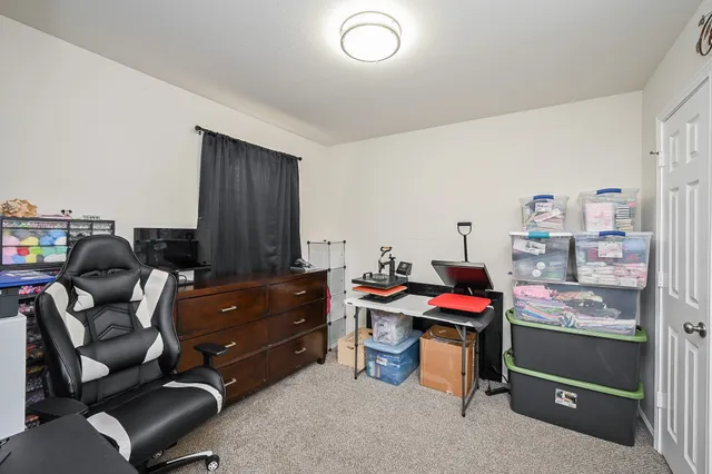 a room with furniture and musical instruments