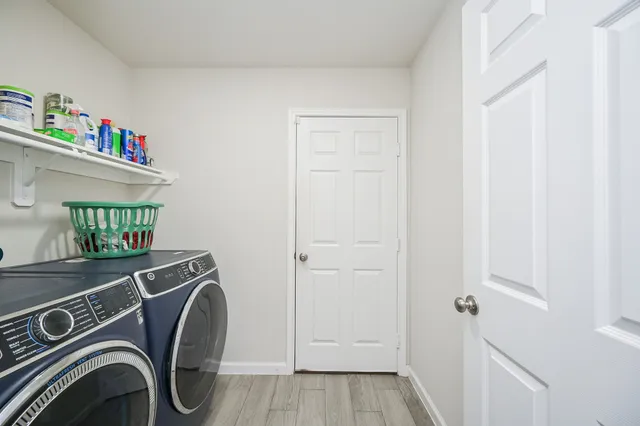 a utility room with dryer and washer