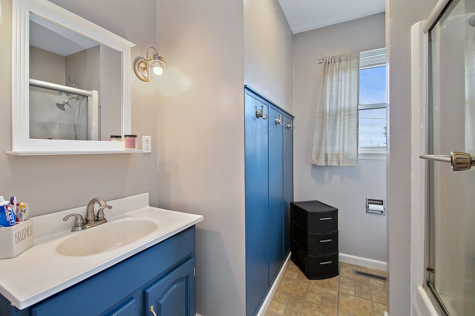 3494 El Paso Drive Kankakee, IL 60901 - Photo 15 of 20 a bathroom with a sink and a mirror