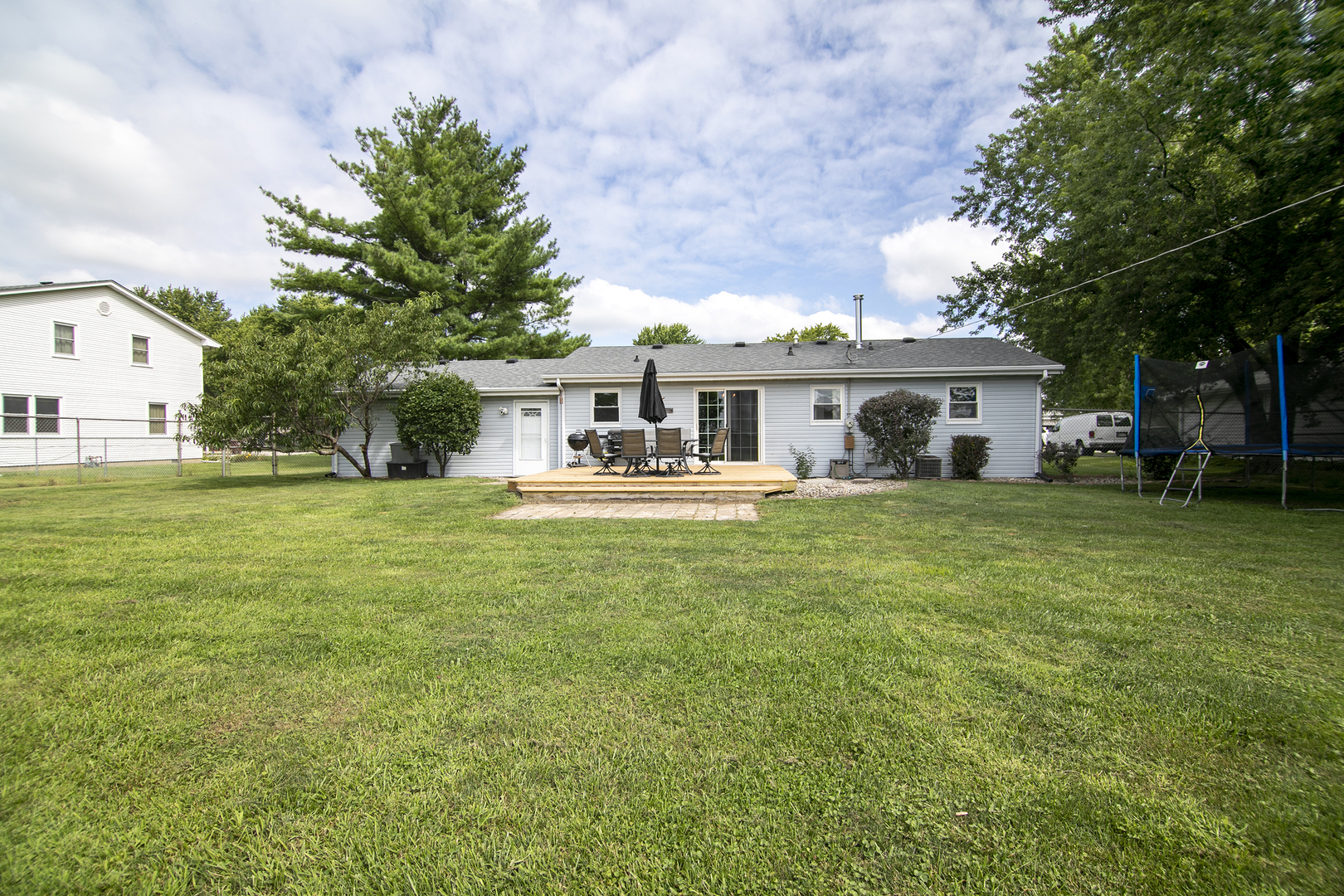3494 El Paso Drive Kankakee, IL 60901 - Photo 20 of 20 a front view of a house with a yard table and chairs