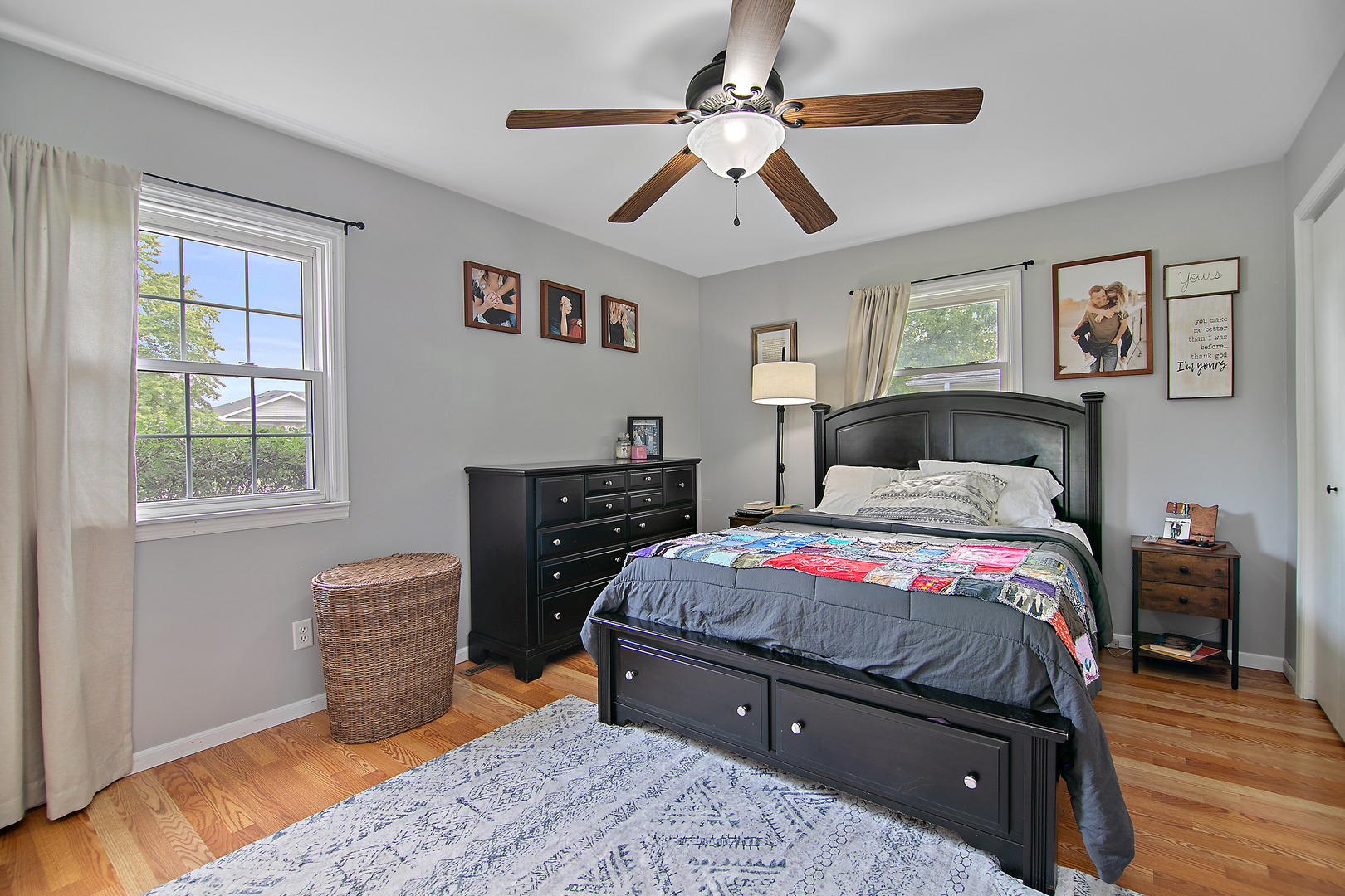 3494 El Paso Drive Kankakee, IL 60901 - Photo 10 of 20 a bedroom with a bed and dresser with wooden floor