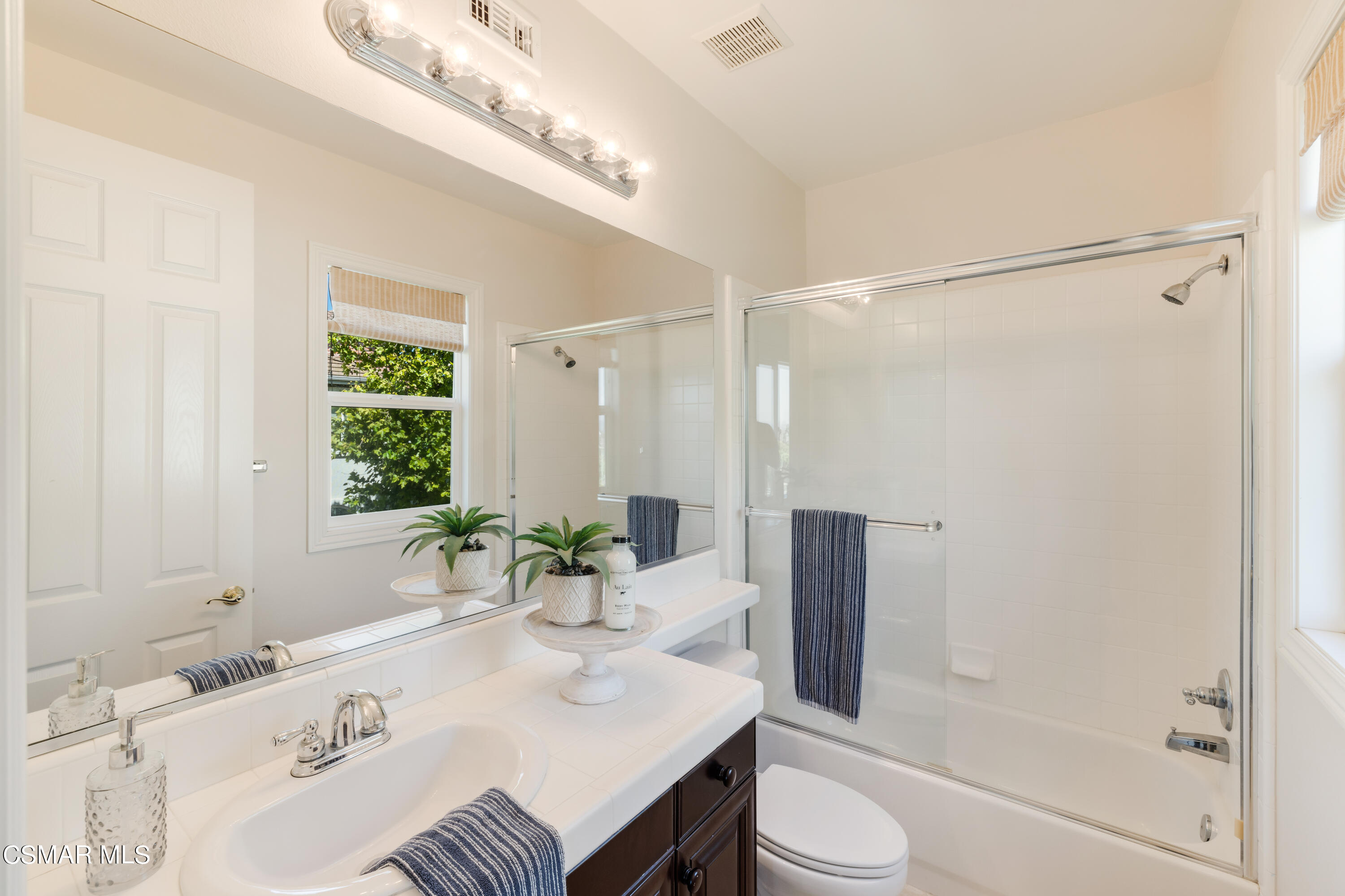 12106 Nelson Road Moorpark, CA 93021 - Photo 33 of 53 a bathroom with a sink toilet and shower