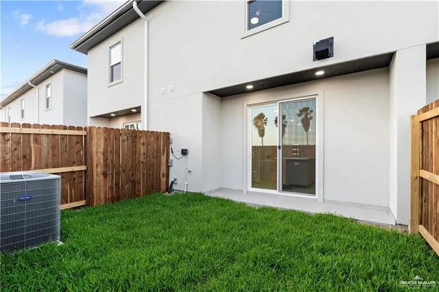 a view of backyard with cabin