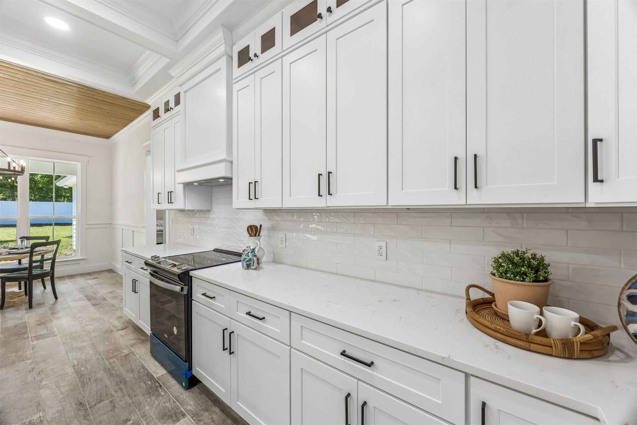 95121 North Ellis Landing Road Fernandina Beach, FL 32034 - Photo 9 of 37 a kitchen with stainless steel appliances white cabinets and a sink