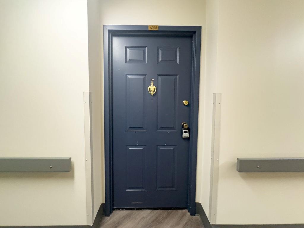a view of a hallway with front door