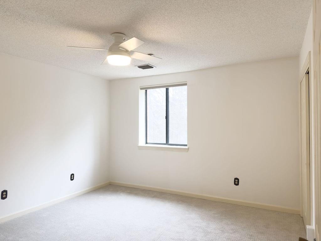 300 Johnson Ferry Road, Unit A305 Atlanta, GA 30328 - Photo 3 of 27 an empty room with a window