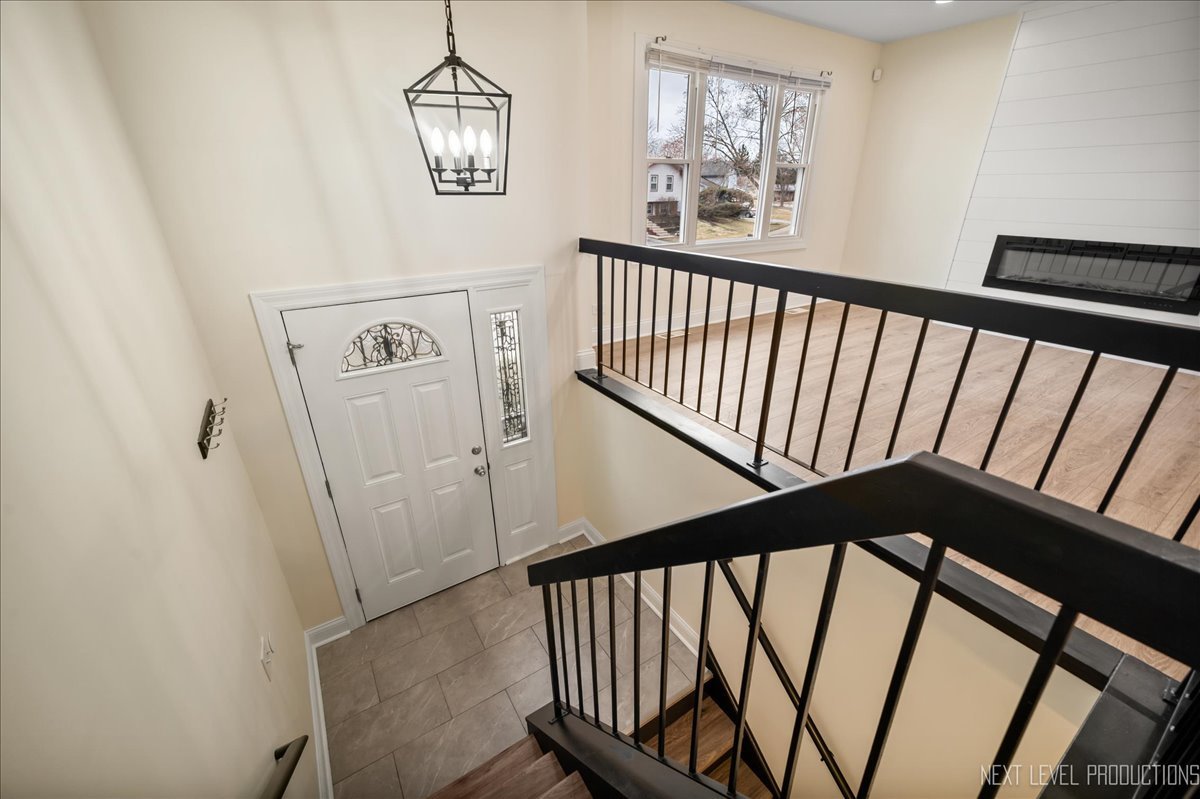 5628 Crestwood Road Matteson, IL 60443 - Photo 16 of 30 a view of a hallway with wooden floor