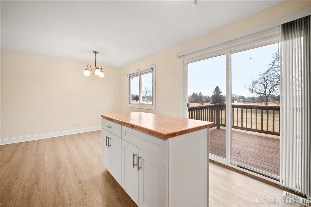 5628 Crestwood Road Matteson, IL 60443 - Photo 6 of 30 a view of a kitchen from a hallway