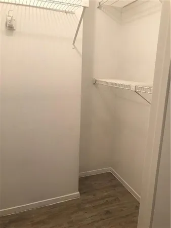 a view of small space with racks on the wall