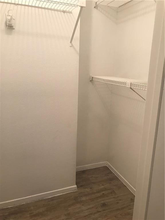 2801 Rio Grande Street, Unit 104 Austin, TX 78705 - Photo 4 of 9 a view of small space with racks on the wall