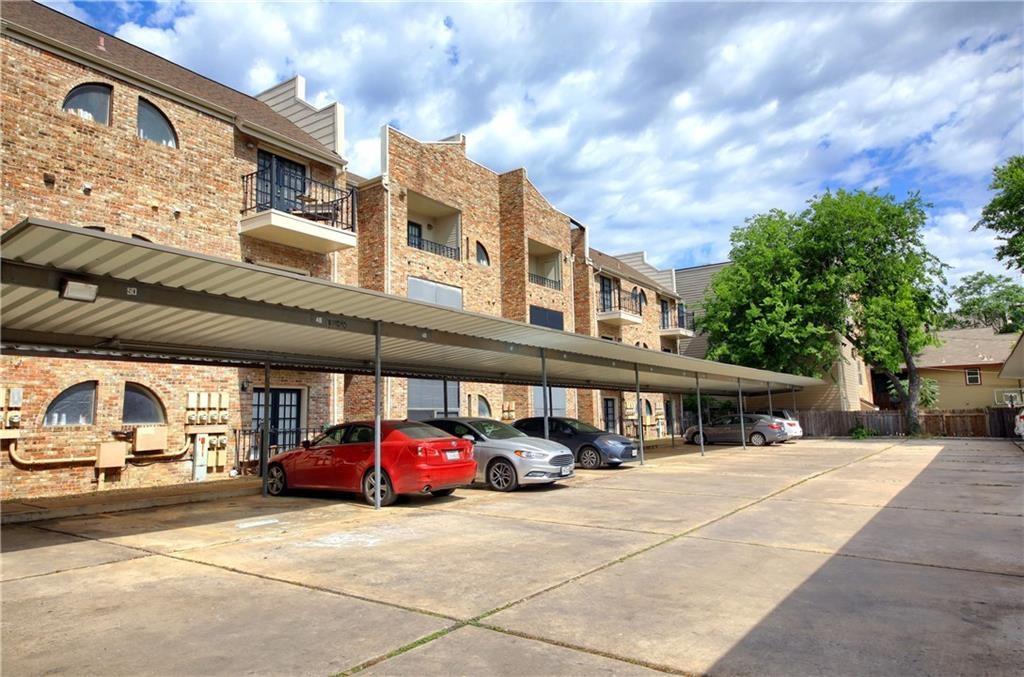 2801 Rio Grande Street, Unit 104 Austin, TX 78705 - Photo 9 of 9 a car parked in front of a building