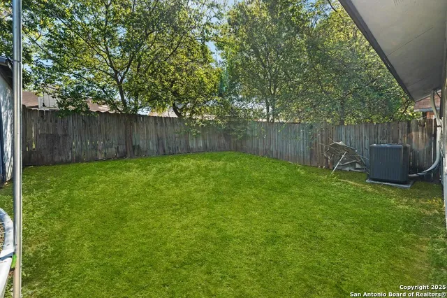 a view of a backyard with a garden