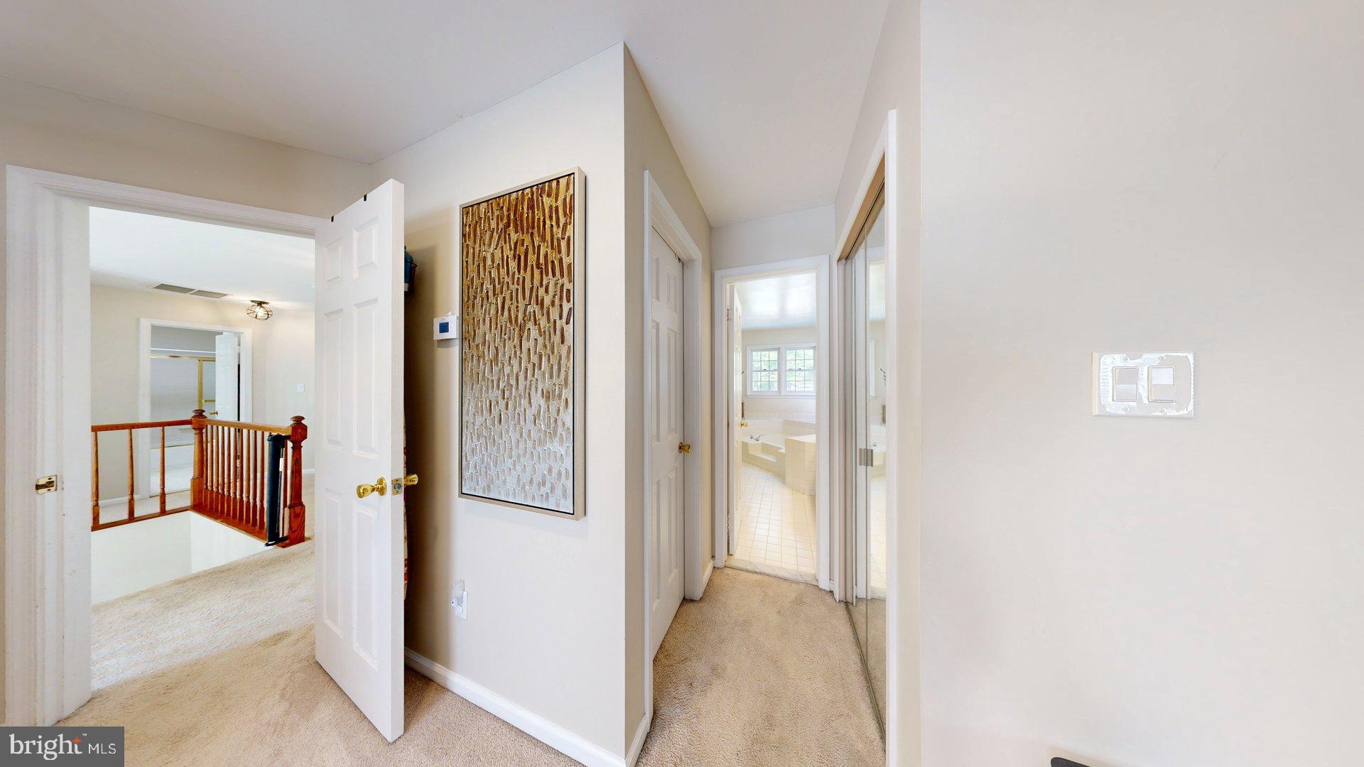 11901 Rustic Farm Court Germantown, MD 20874 - Photo 57 of 134 Inviting hallway with natural light.