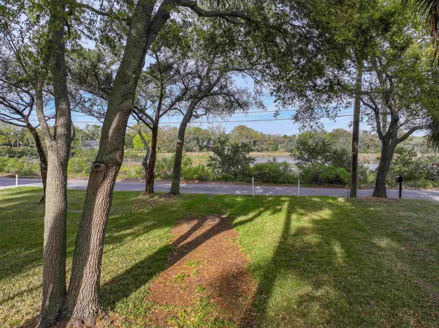 a view of swimming pool with a yard