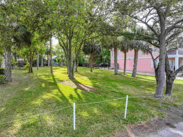 a childrens park with lots of trees