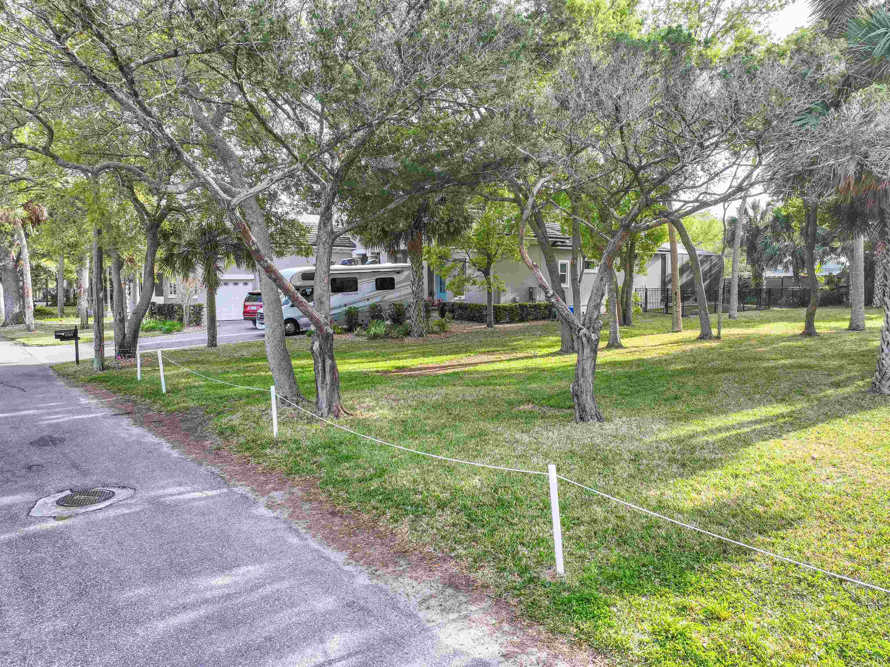 160 Washington Street St. Augustine, FL 32084 - Photo 21 of 56 a childrens park with lots of trees