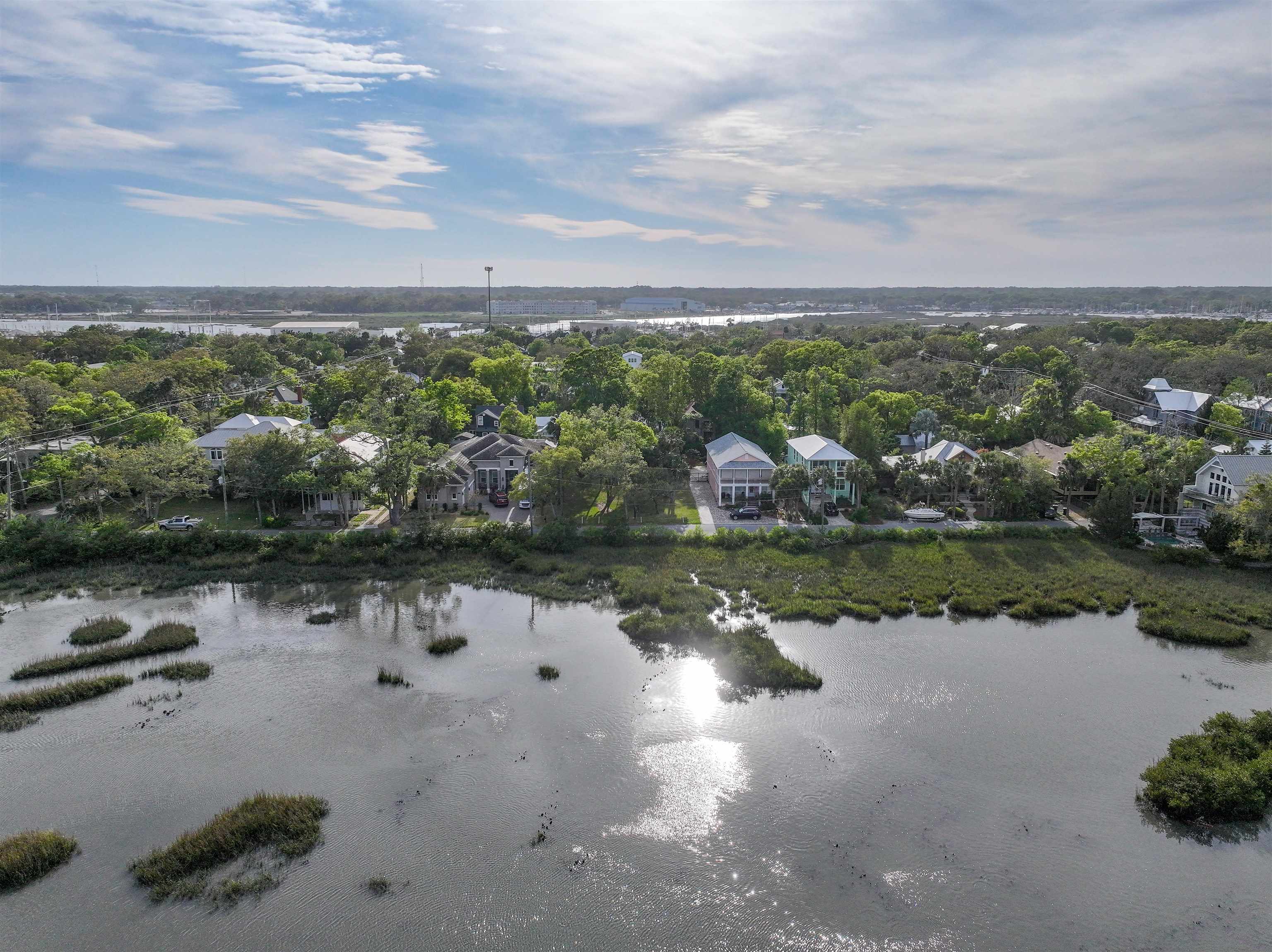 160 Washington Street St. Augustine, FL 32084 - Photo 24 of 56 an aerial view of lake and residential houses with outdoor space