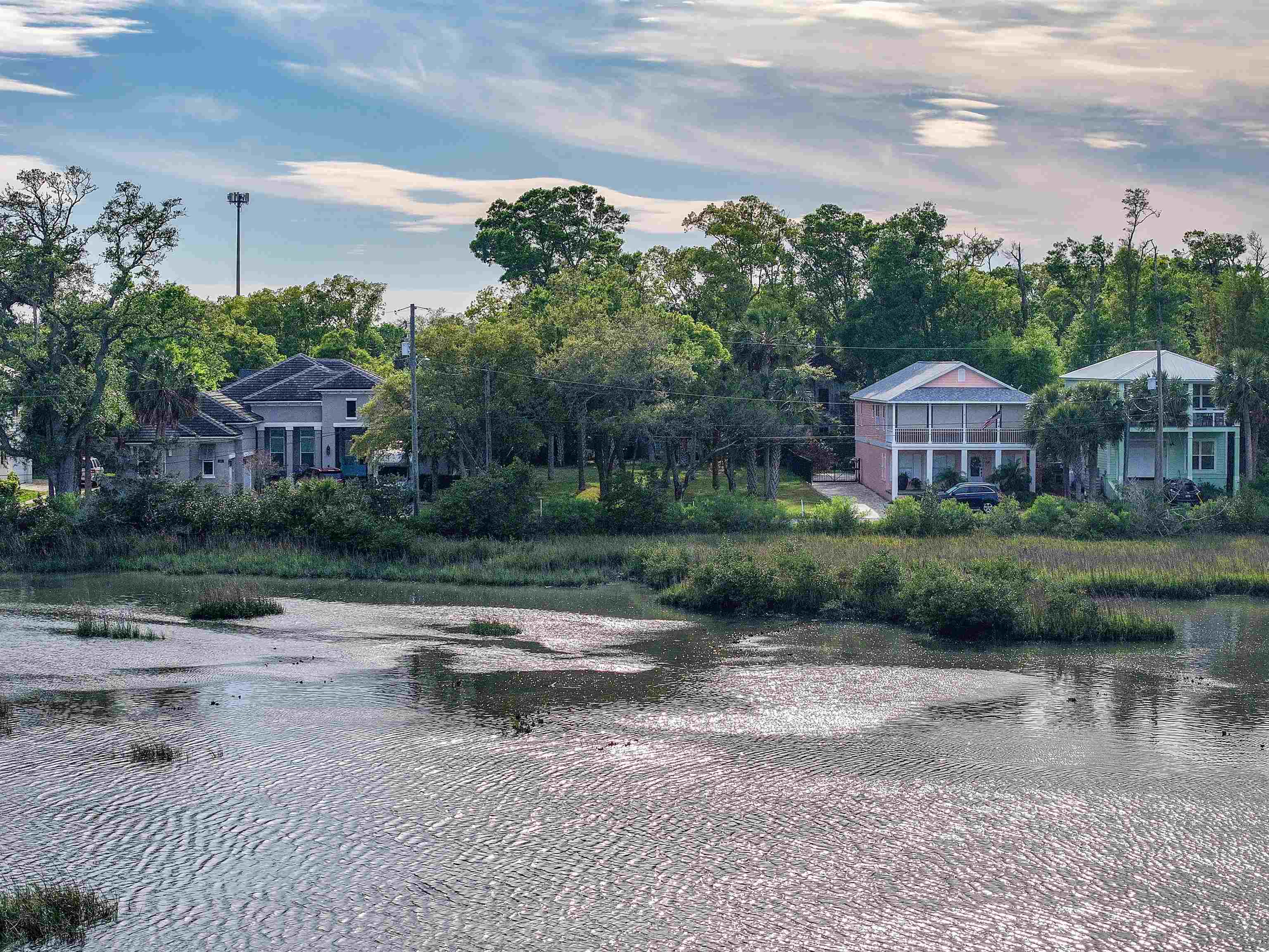 160 Washington Street St. Augustine, FL 32084 - Photo 33 of 56 front view of a house with a yard