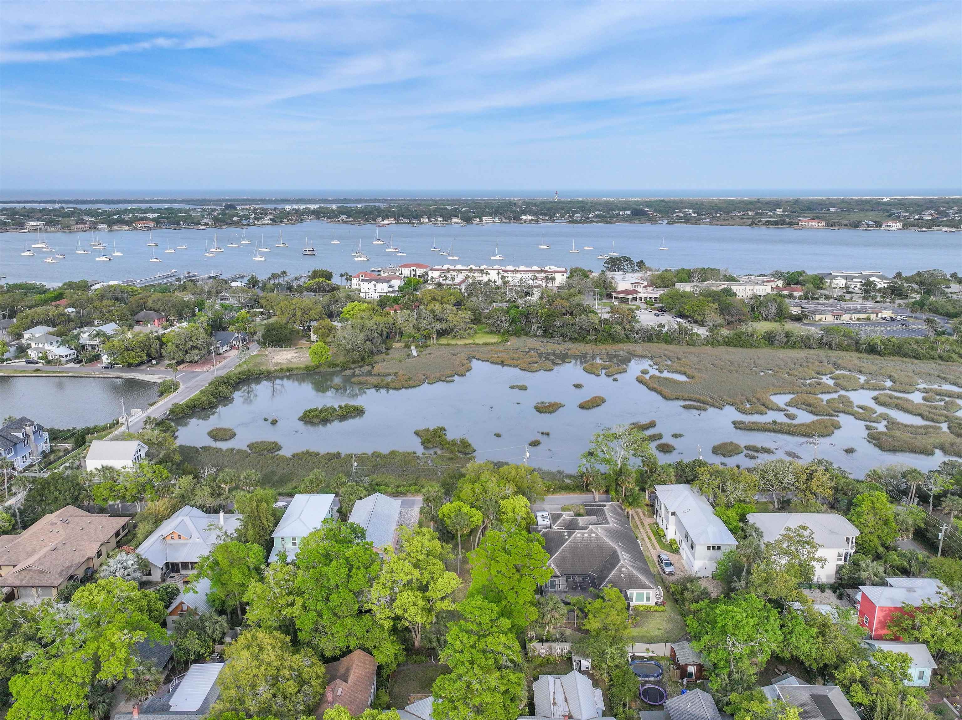160 Washington Street St. Augustine, FL 32084 - Photo 39 of 56 an aerial view of lake and residential houses with outdoor space