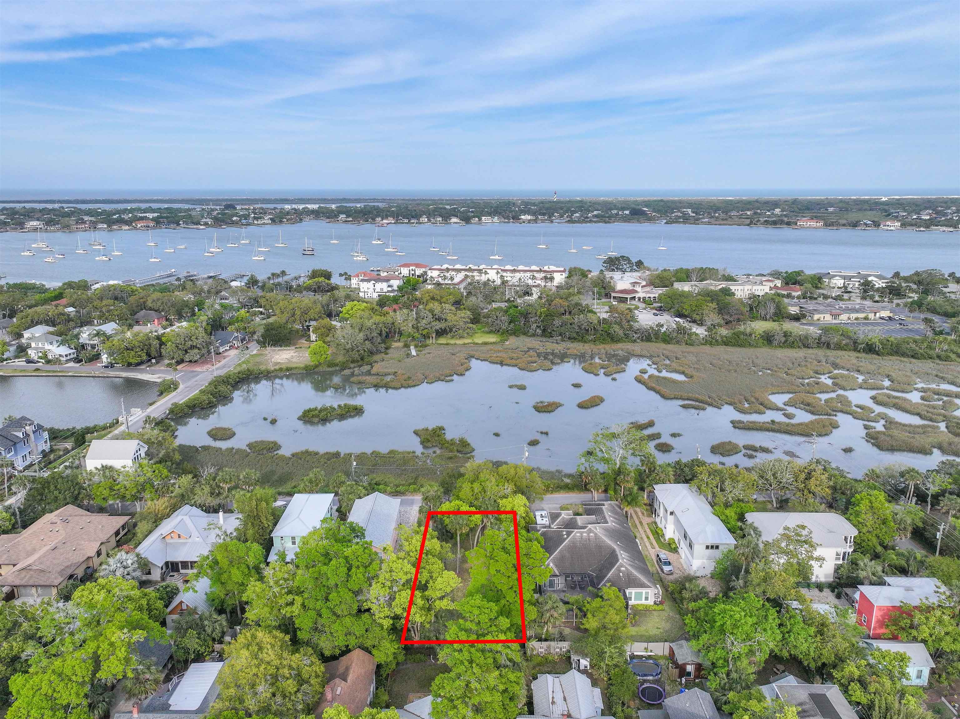160 Washington Street St. Augustine, FL 32084 - Photo 4 of 56 an aerial view of lake and residential houses with outdoor space