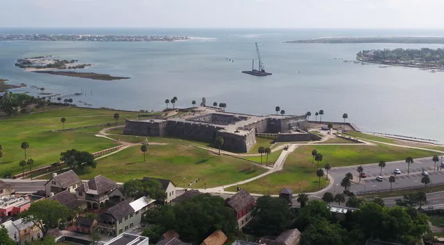 a view of a lake with a mountain in the back
