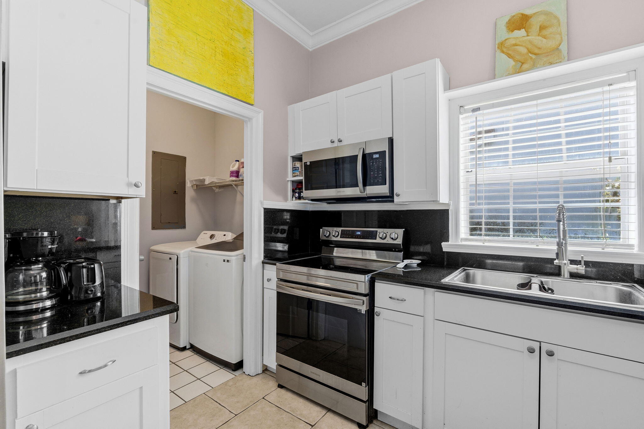 65 Vantage Point Miramar Beach, FL 32550 - Photo 11 of 63 a kitchen with a sink a stove and cabinets